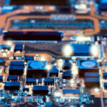 Closeup-on-electronic-board-in-hardware-repair-shop-blurred-and-toned-image