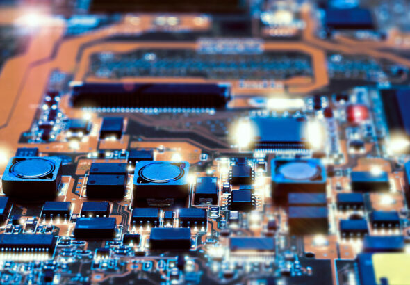 Closeup-on-electronic-board-in-hardware-repair-shop-blurred-and-toned-image